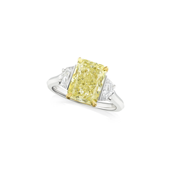 4.05cts Yellow Diamond and Shield Cut Diamond Three Stone Ring