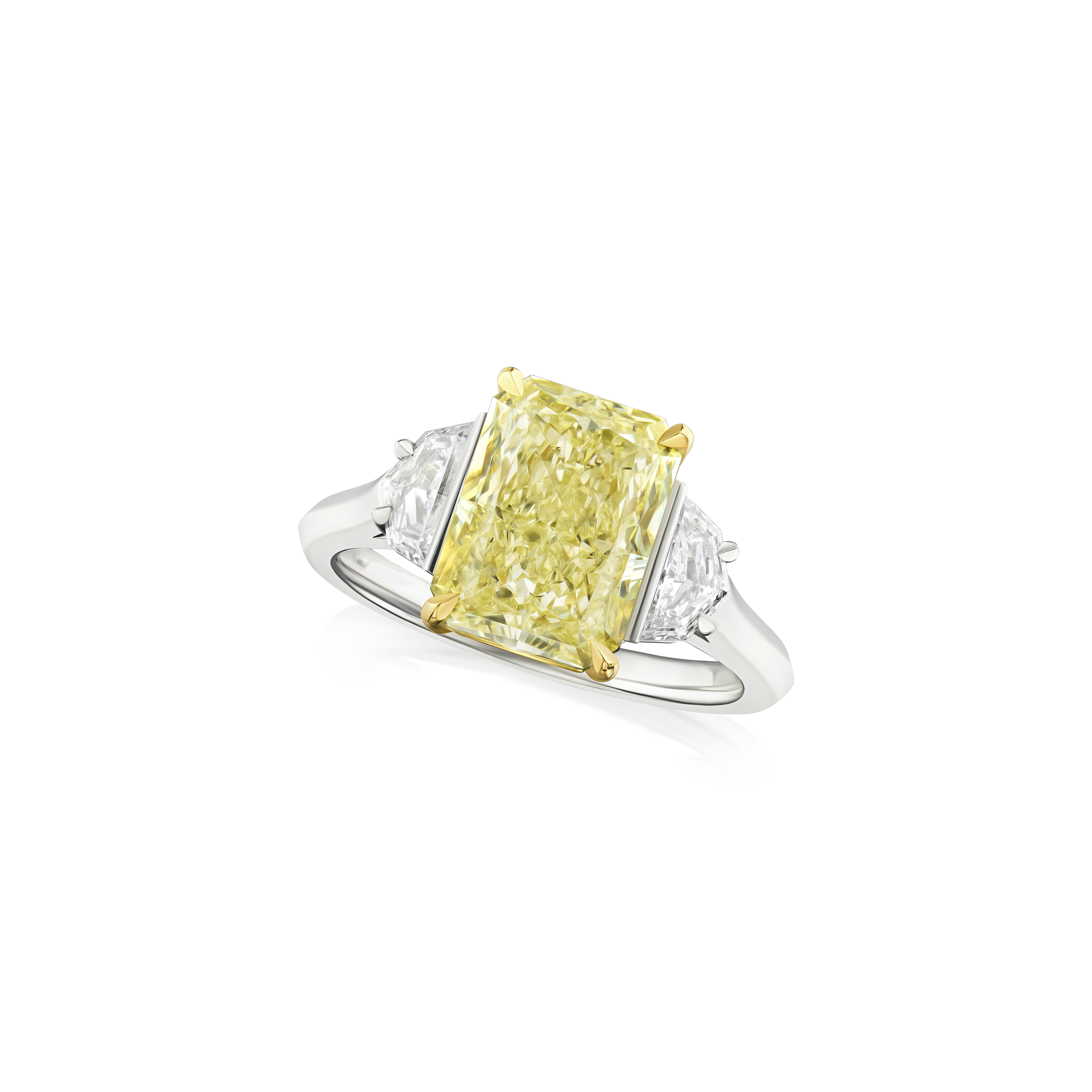 4.05cts Yellow Diamond and Shield Cut Diamond Three Stone Ring