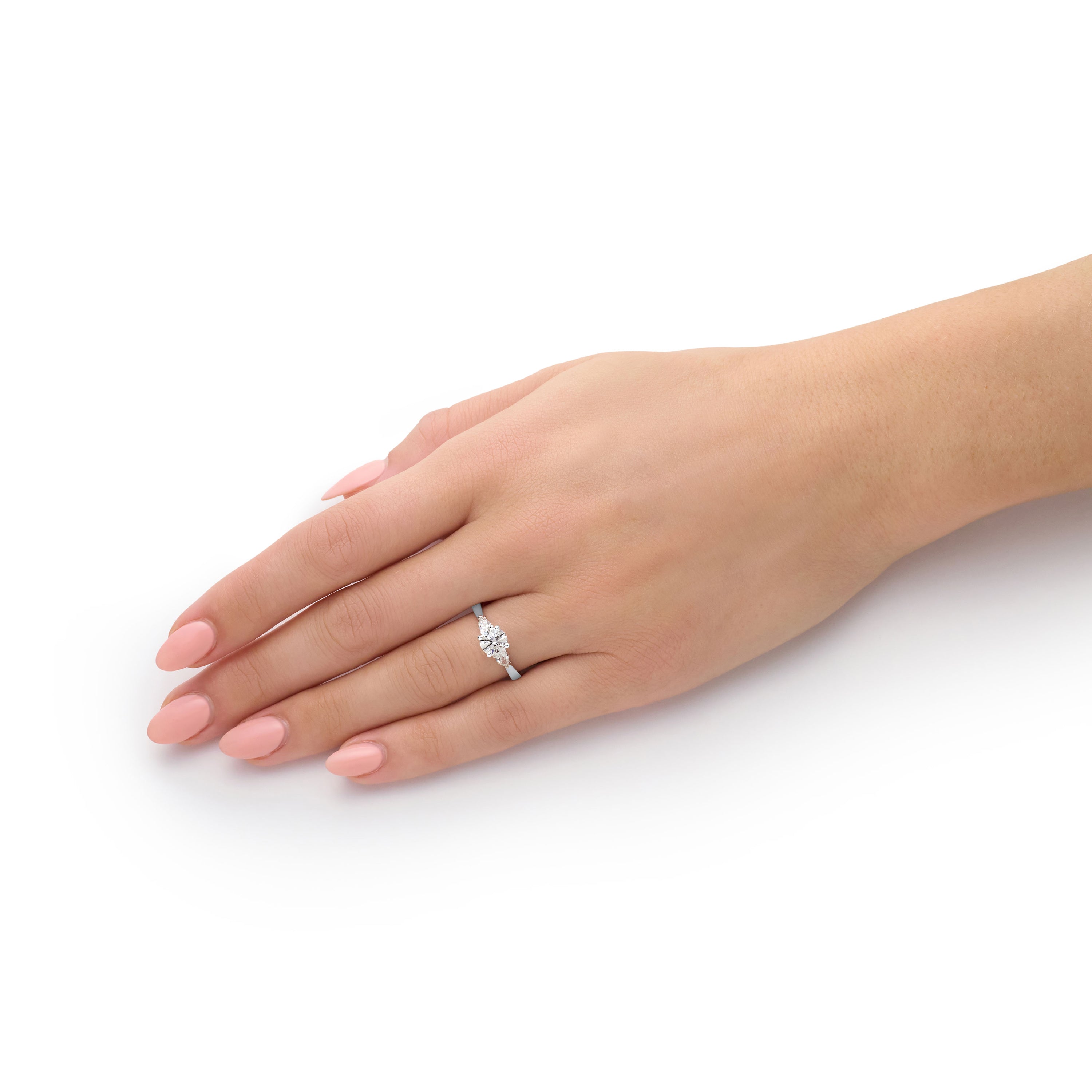 0.90ct Round Brilliant and Pear Cut Diamond Three Stone Ring