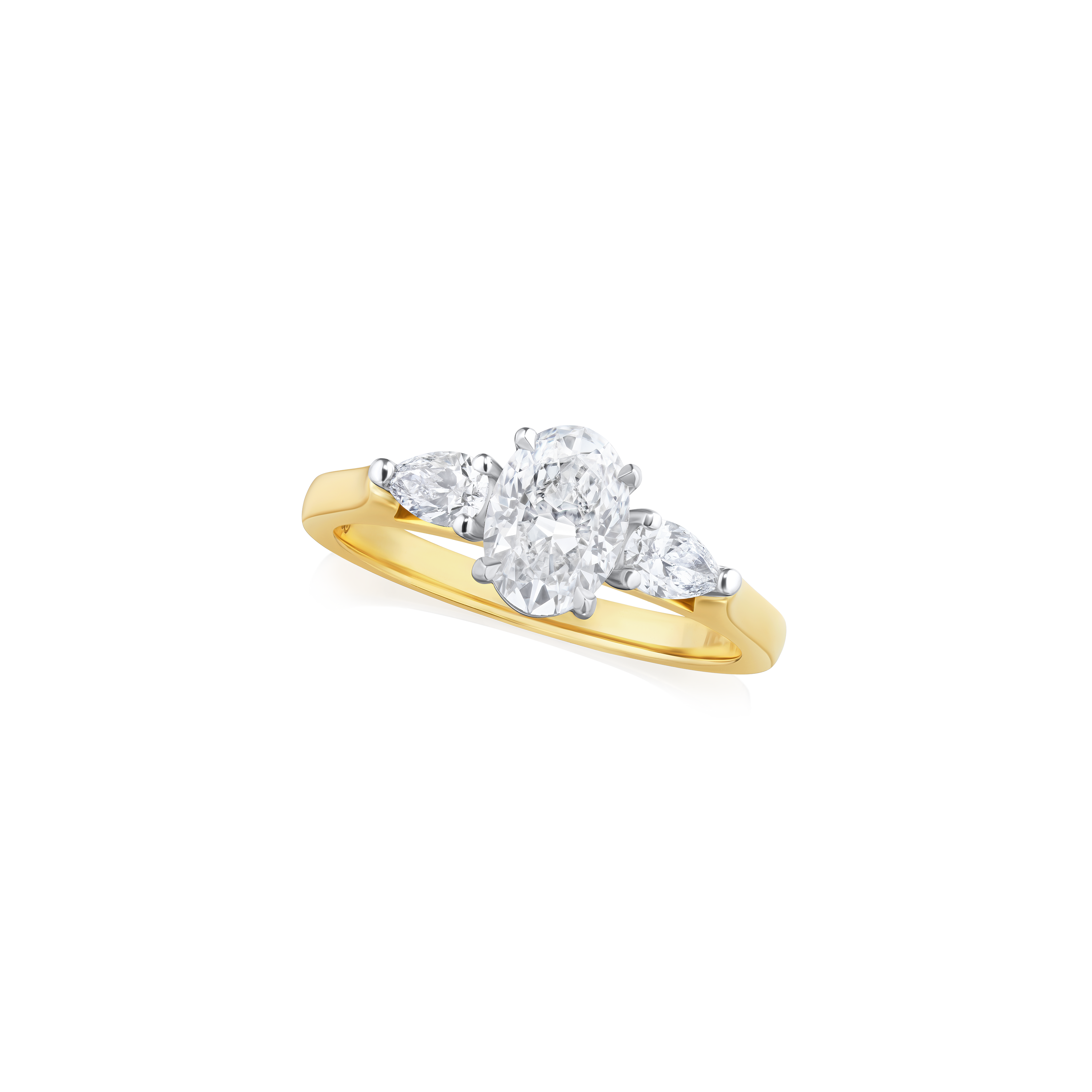 Oval and Pear Cut Diamond Three Stone Ring