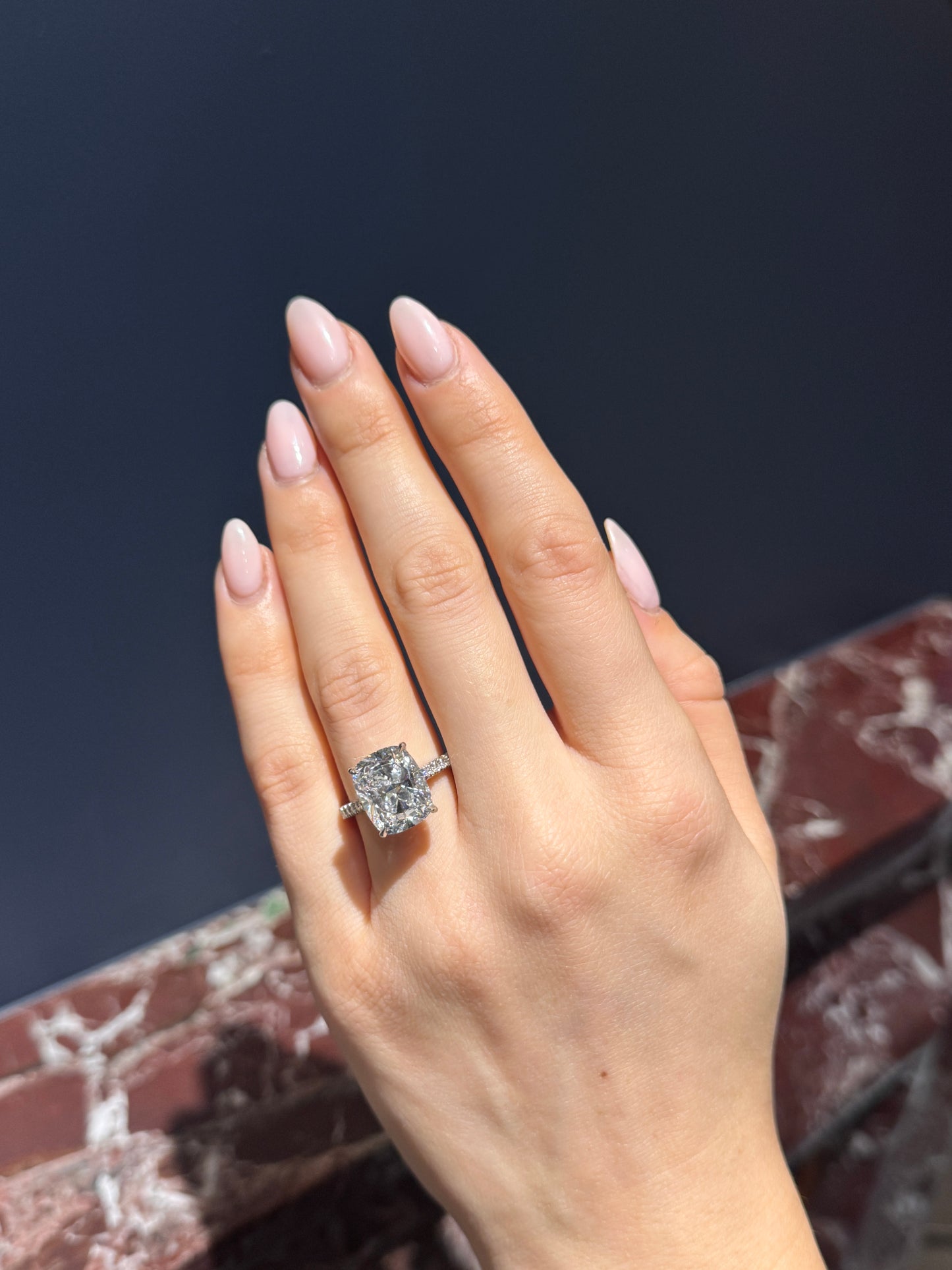 6.01ct Cushion Cut Diamond Ring With Diamond Set Shoulders and Bezels