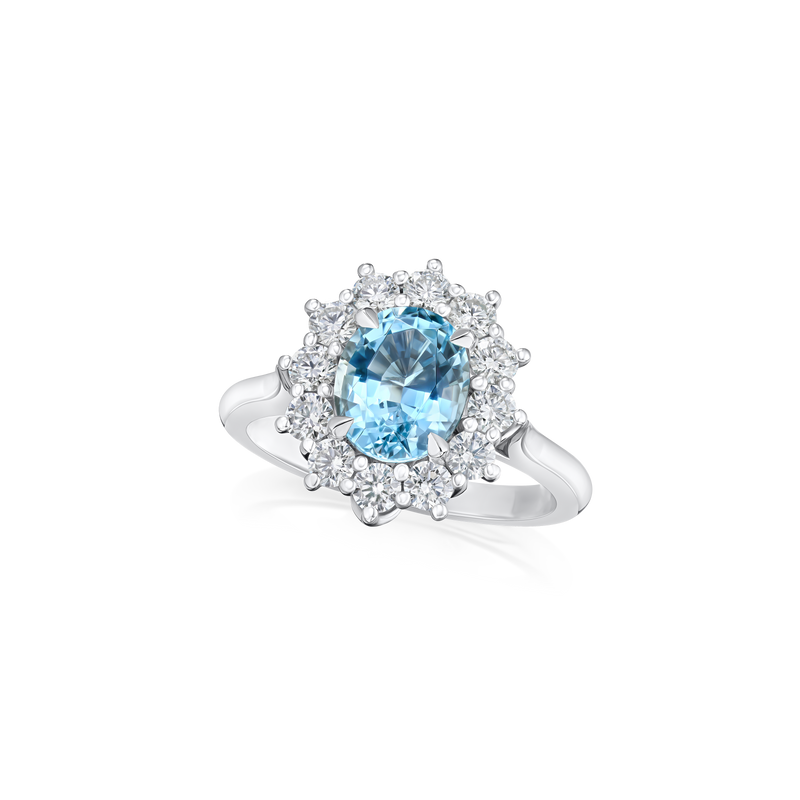 1.58cts Oval Aquamarine and Diamond Cluster Ring