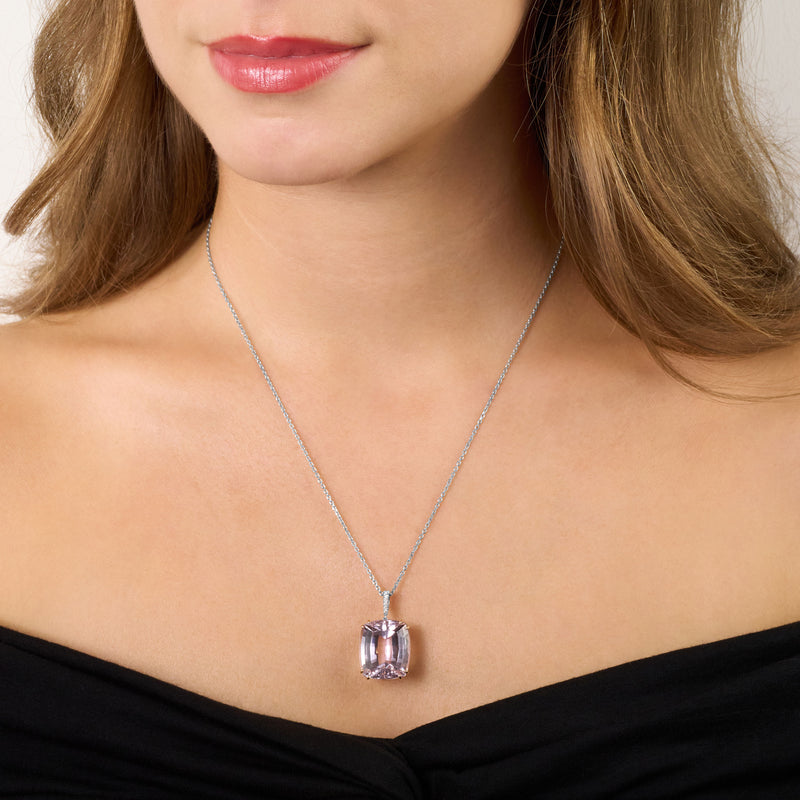 25.09cts Kunzite Pendant With A Diamond Set Bale