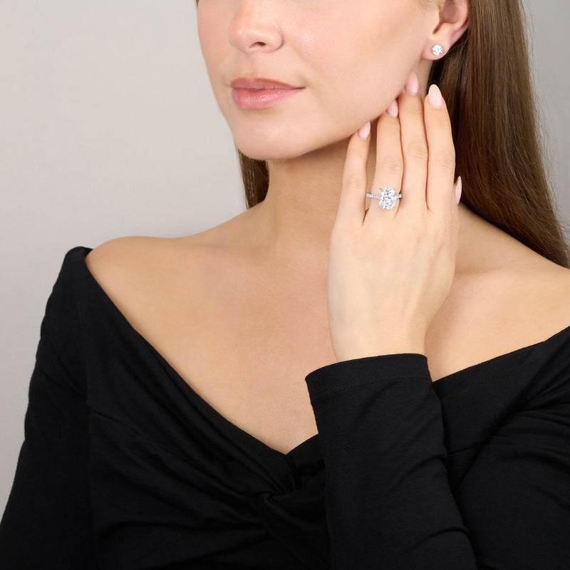 6.01ct Cushion Cut Diamond Ring With Diamond Set Shoulders and Bezels