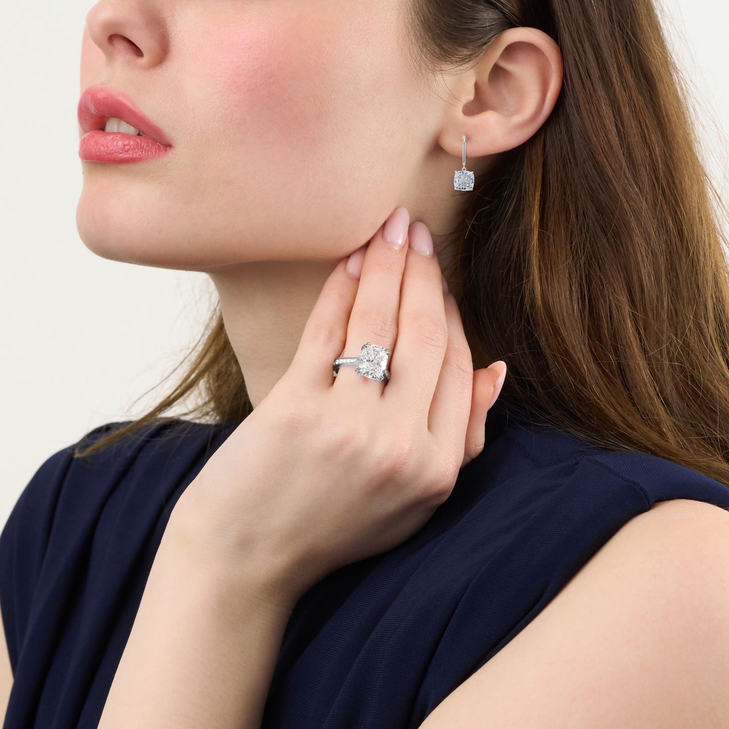 5.24ct Cushion Cut Diamond Ring With Diamond Set Shoulders and Bezels