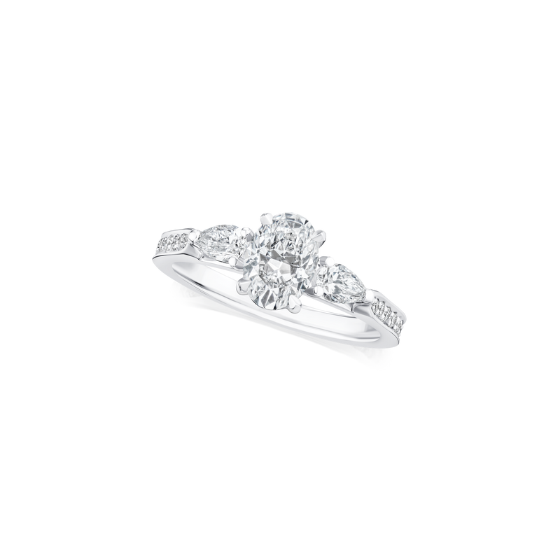 Oval and Pear Cut Diamond Three Stone Ring