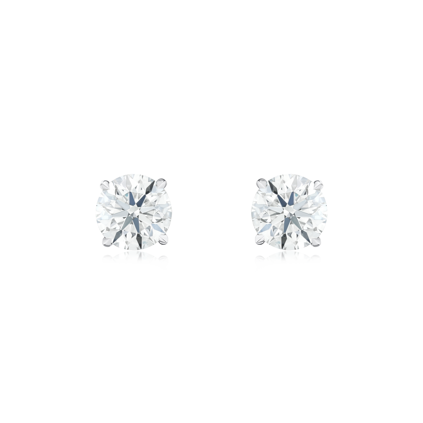 Round Brilliant Cut Diamond Single Stone Stud Earrings.