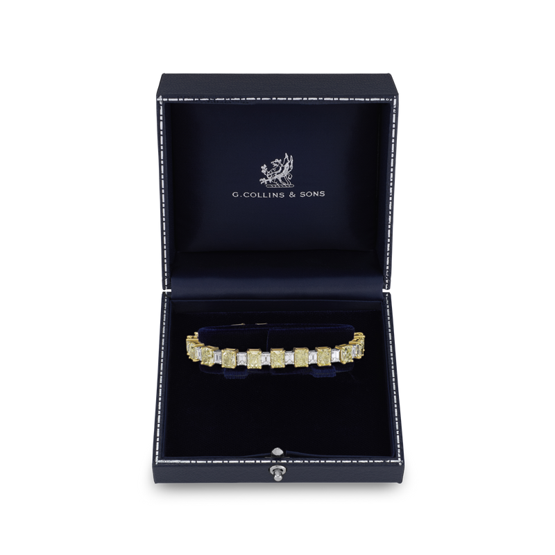 22.42cts Radiant Cut yellow Diamond and Emerald Cut Diamond Line Bracelet