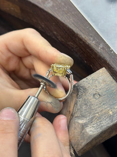 9.56cts Radiant Cut Yellow Diamond Three Stone Ring