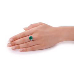 Octagon Emerald and Shield-Cut Diamond Three Stone Ring