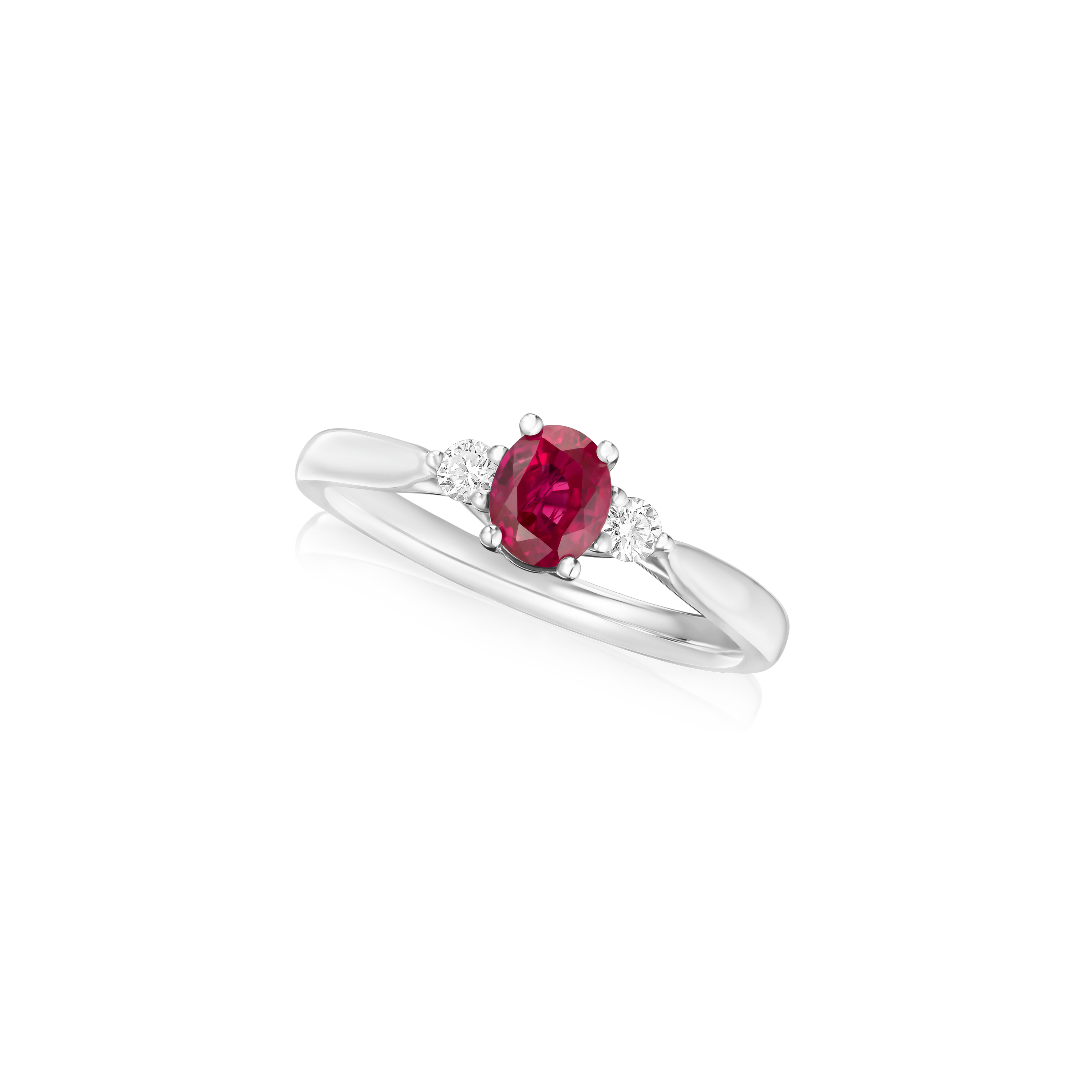 Oval Ruby and Diamond Three Stone Ring